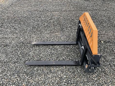 hydraulic sliding skid steer pallet forks|wolverine pallet fork hydraulic adjustable.